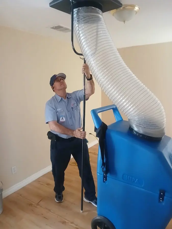 HVAC Installation technician using HEPA equipment in Mead